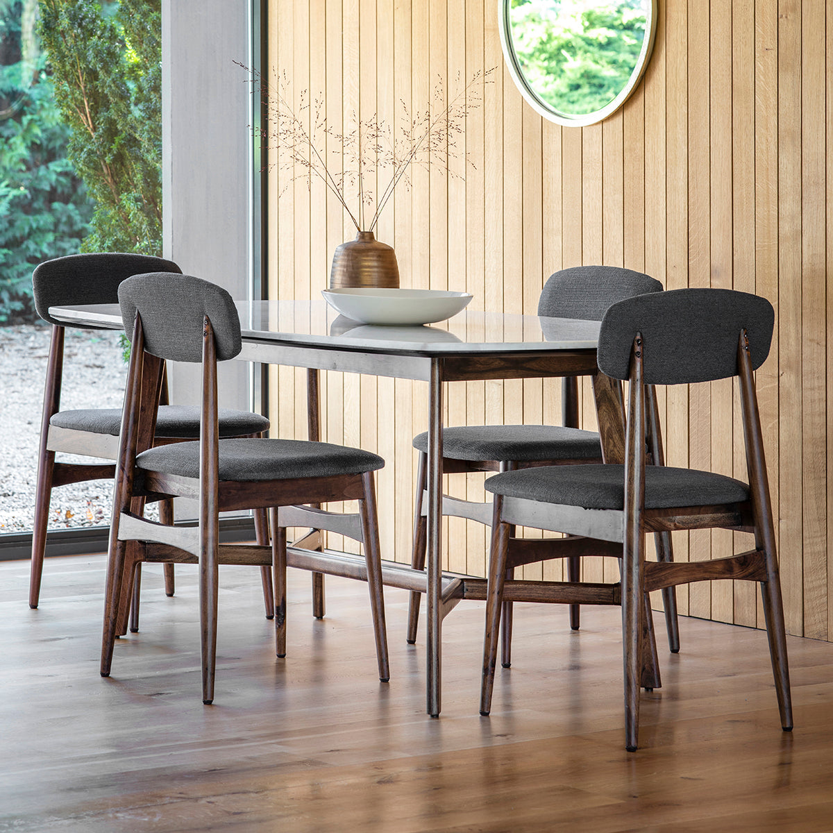 An Avonwick Dining Table 1600x900x760mm with four chairs for home furniture and interior decor enthusiasts from Kikiathome.co.uk.