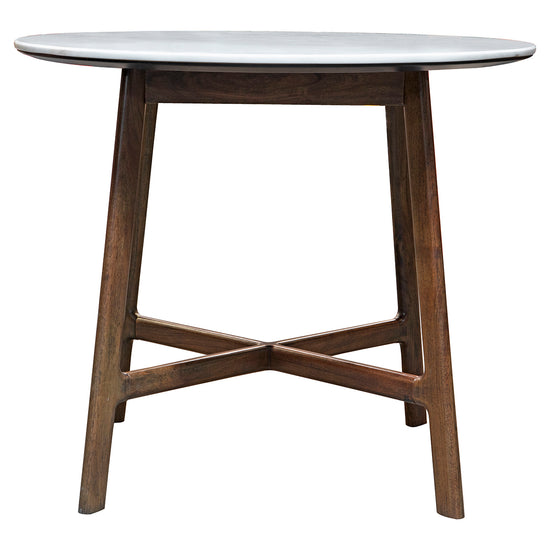 An Avonwick Dining Table Round with a white top and wooden legs for interior decor.