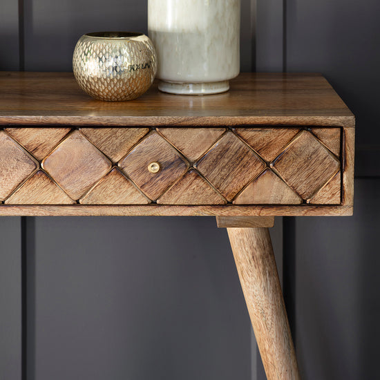 A Tuscany Console Table Burnt Wax 1100x450x760mm by Kikiathome.co.uk for interior decor with a vase on it.