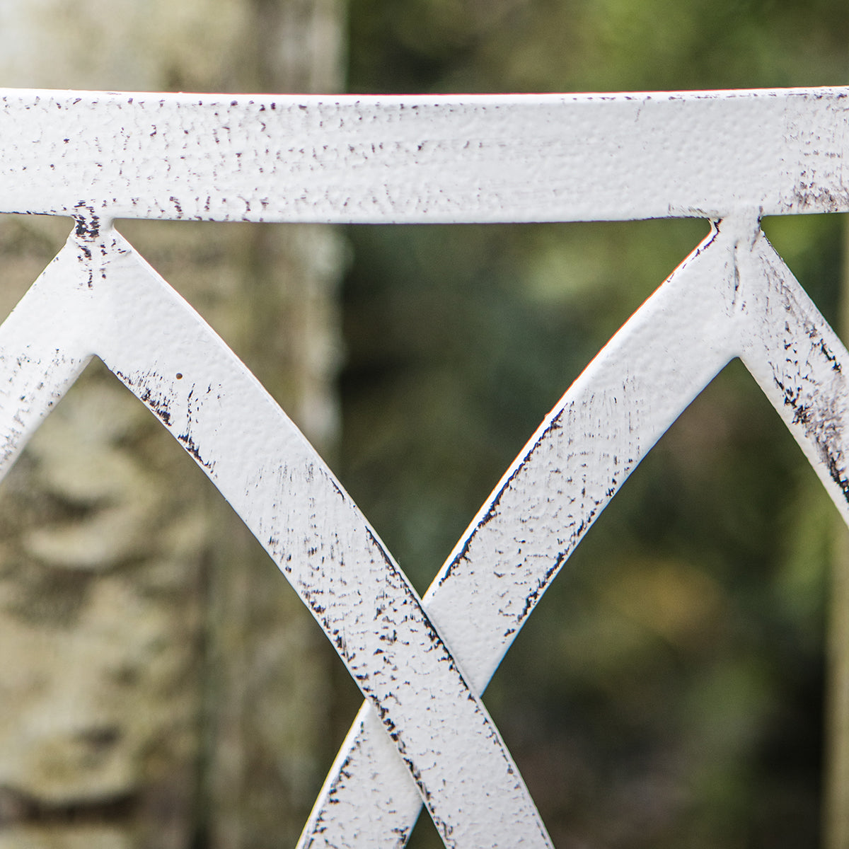 A close up of a Widecombe Outdoor Tree Bench Seat Gatehouse for interior decor.