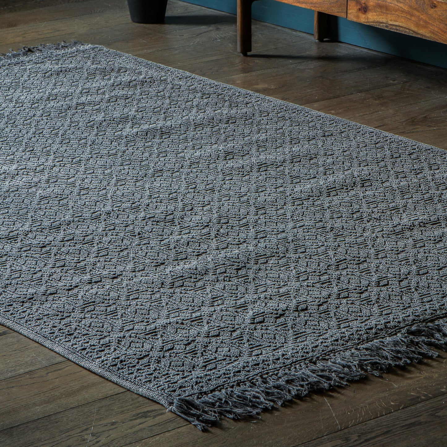 Load image into Gallery viewer, A charcoal rug with fringes, perfect for interior decor and home furniture.
