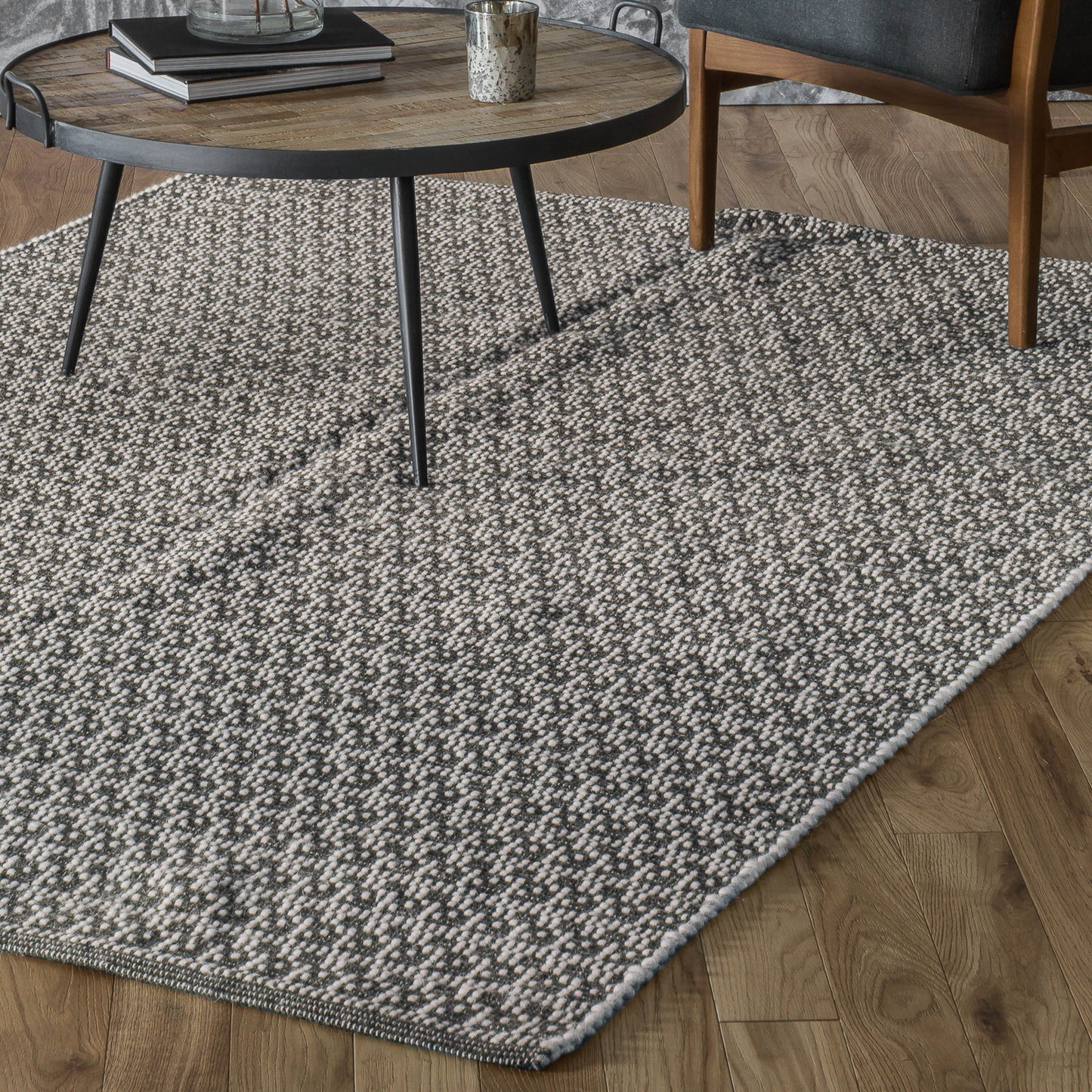 An Kellaton Rug Natural 1600x2300mm from Kikiathome.co.uk adds to the interior decor of a home with a wooden floor.