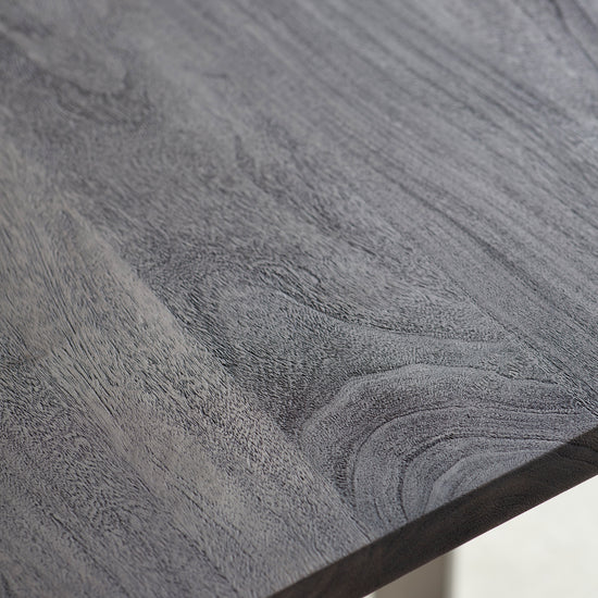 A close up view of a Southpool Dining Table in Grey, an exquisite piece of home furniture from Kikiathome.co.uk.