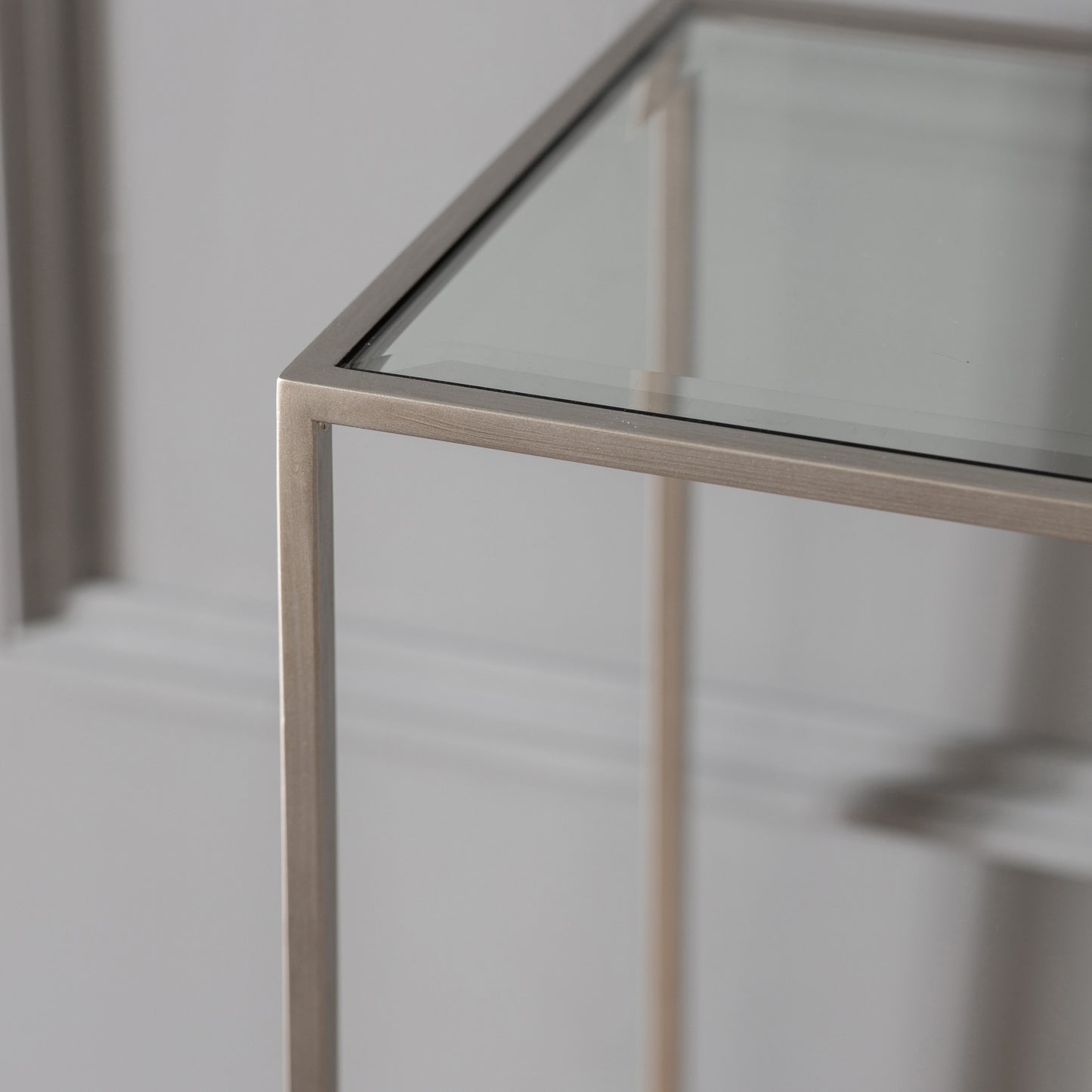 A silver Console Table with a metal frame for home furniture by Kikiathome.co.uk.