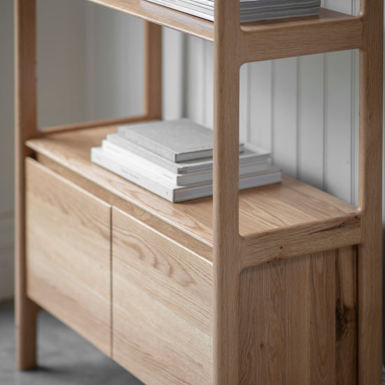 A Dairy Open Display shelf with books on it for interior decor from Kikiathome.co.uk.