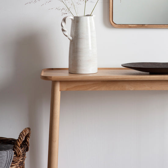 A 1100x380x800mm console table with a vase and mirror, perfect for home furniture and interior decor from Kikiathome.co.uk.