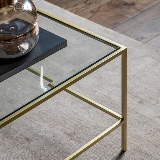 Engleborne Coffee Table Champagne with a gold frame - perfect for interior decor and home furniture.