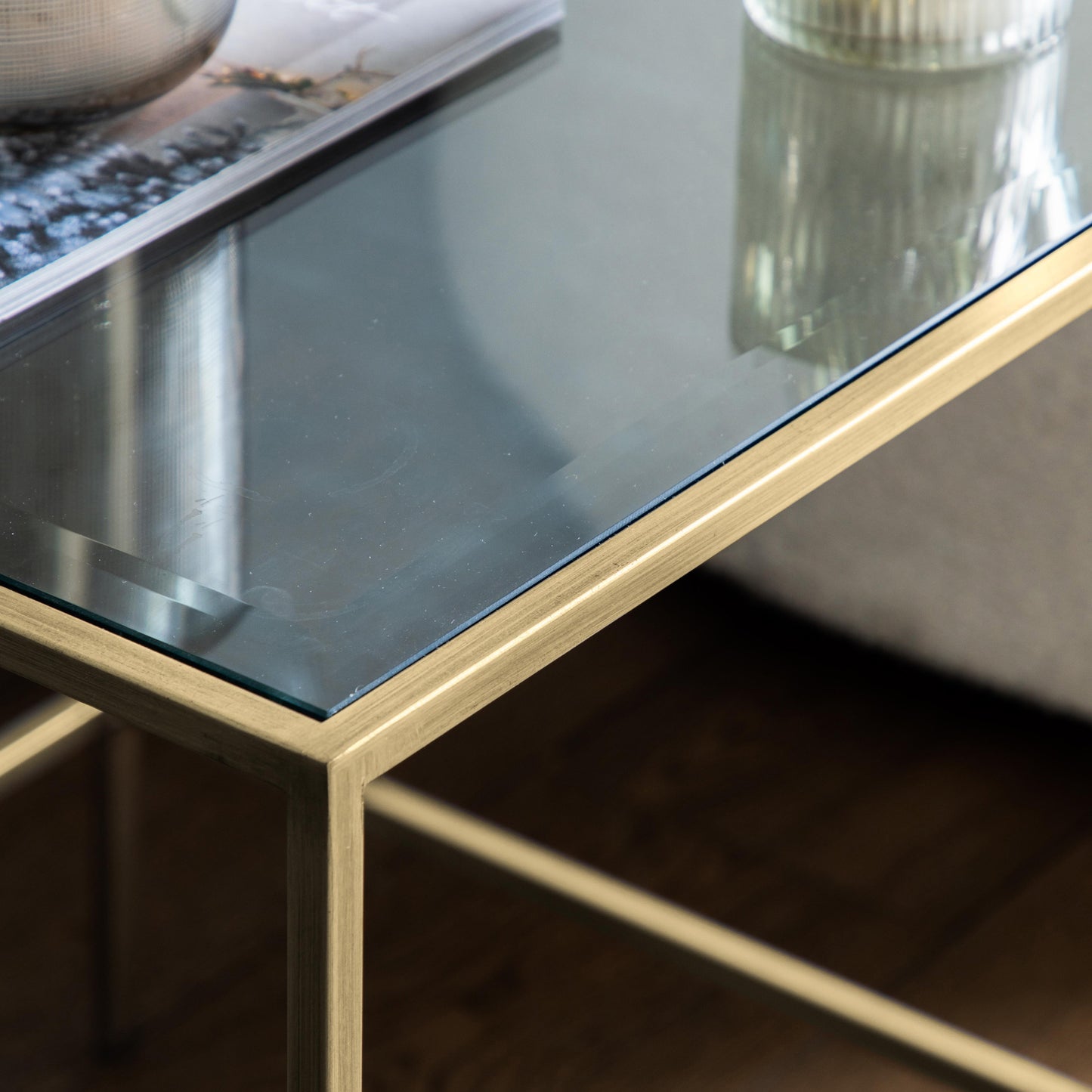 An Engleborne Side Table Champagne 500x500x550mm with a gold frame for interior decor.