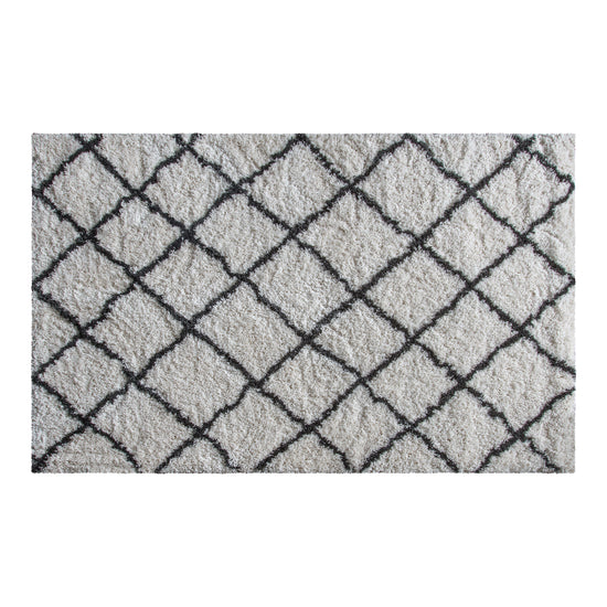 A Bickleigh Rug Cream with a diamond pattern for interior decor.