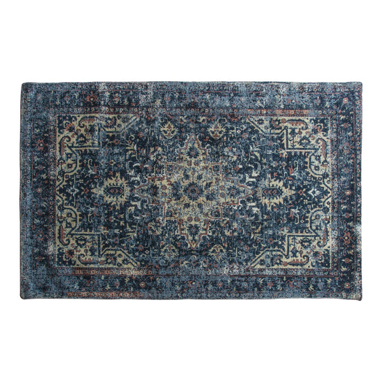 A Dark Teal Kern Rug with an ornate design, perfect for home furniture and interior decor.