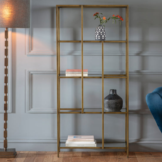 An Engleborne Display Unit Bronze 700x320x1505mm by Kikiathome.co.uk in a room with home furniture and interior decor.