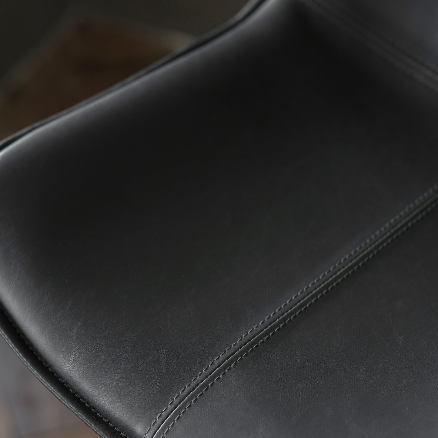 A close up of a Slapton Chair Charcoal (2pk) 490x550x860mm, perfect for interior decor and home furniture.