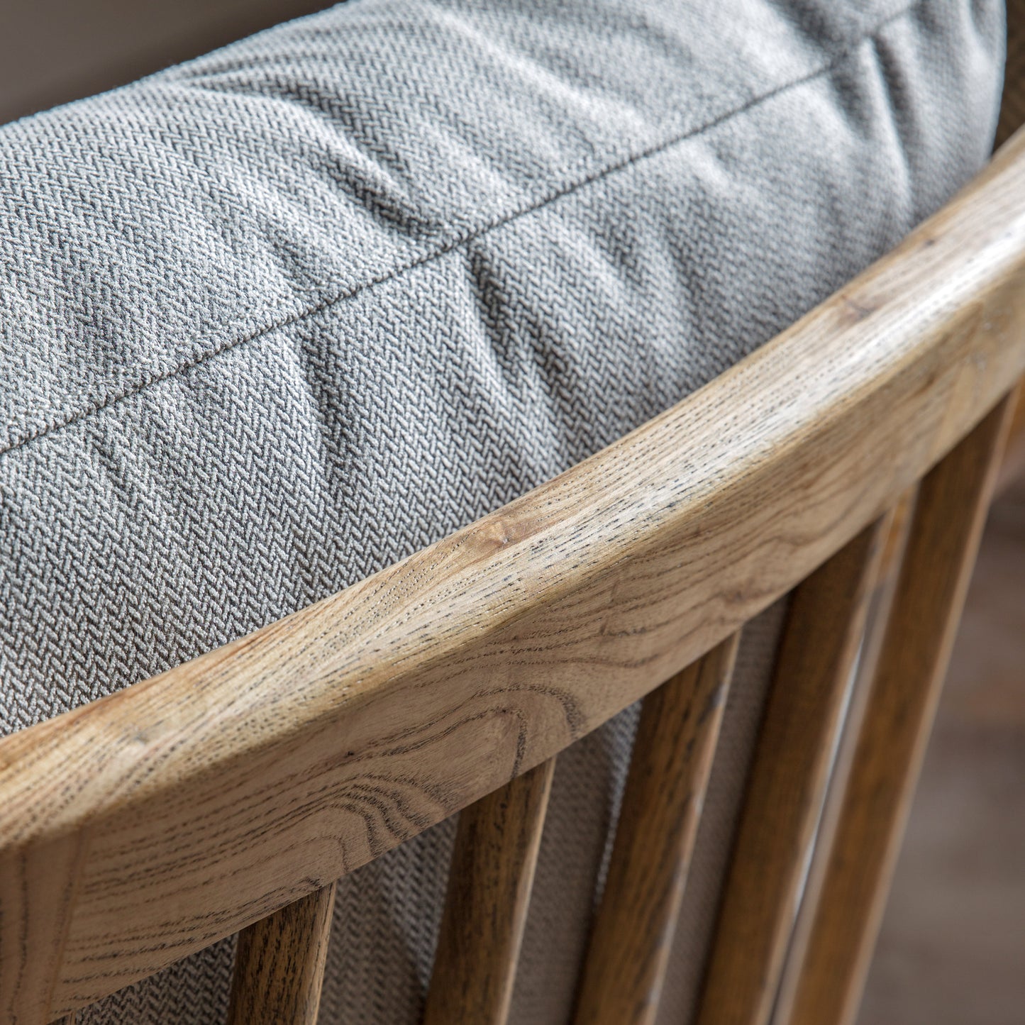 Close up of a Reliant Armchair Natural Linen 620x830x880mm, showcasing exquisite interior decor.