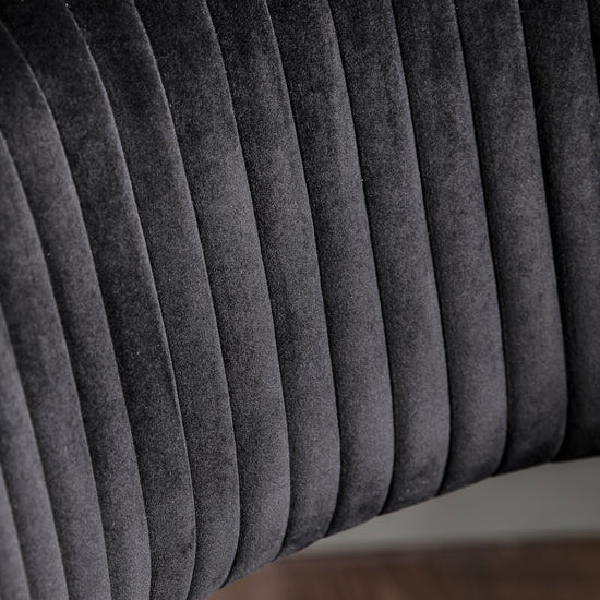 A Murray Swivel Chair Black Velvet for interior decor.