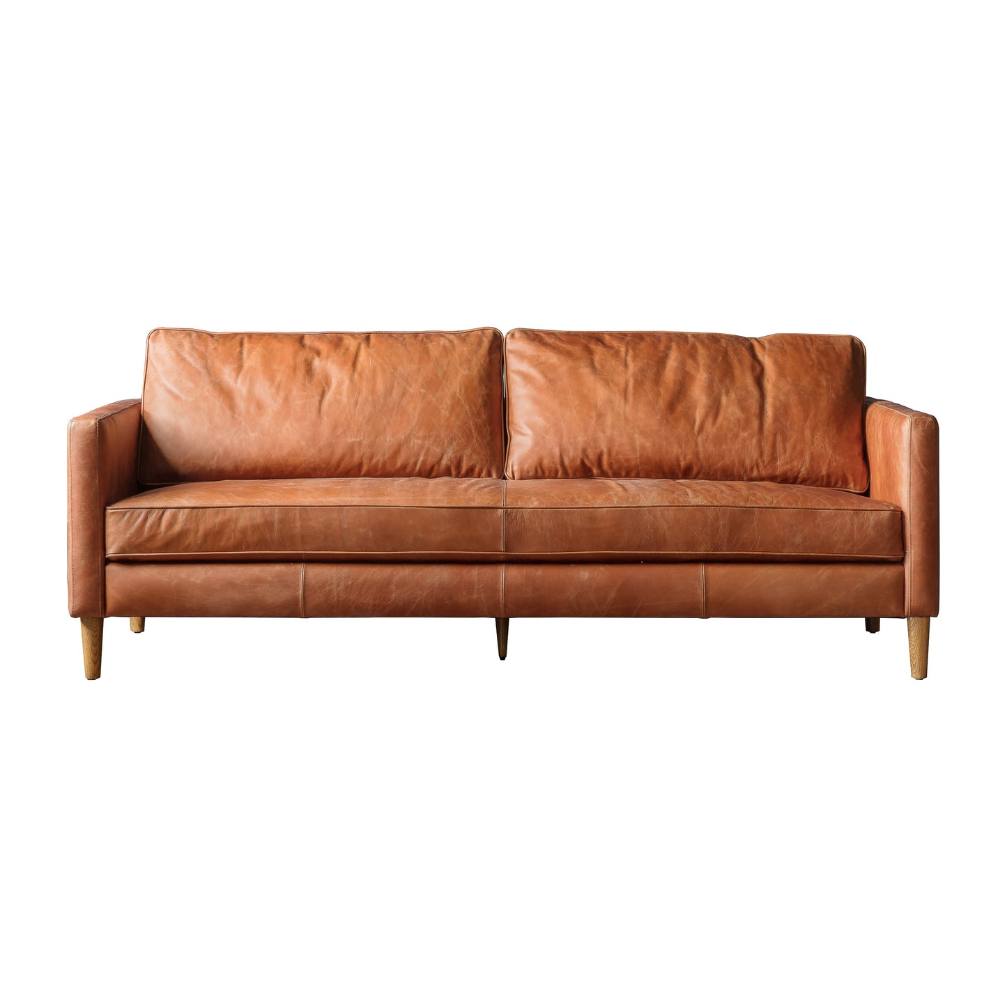 Vintage brown leather sofa on a white background for interior decor and home furniture.
