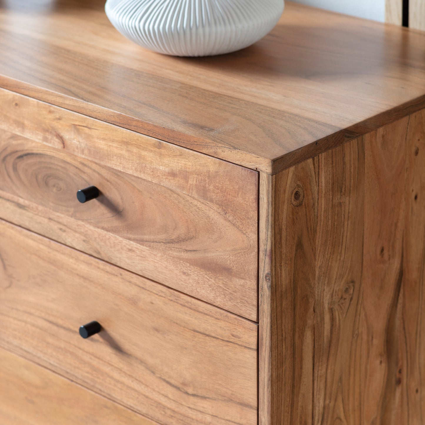 A home furniture sideboard from Kikiathome.co.uk with interior decor featuring a vase on top.