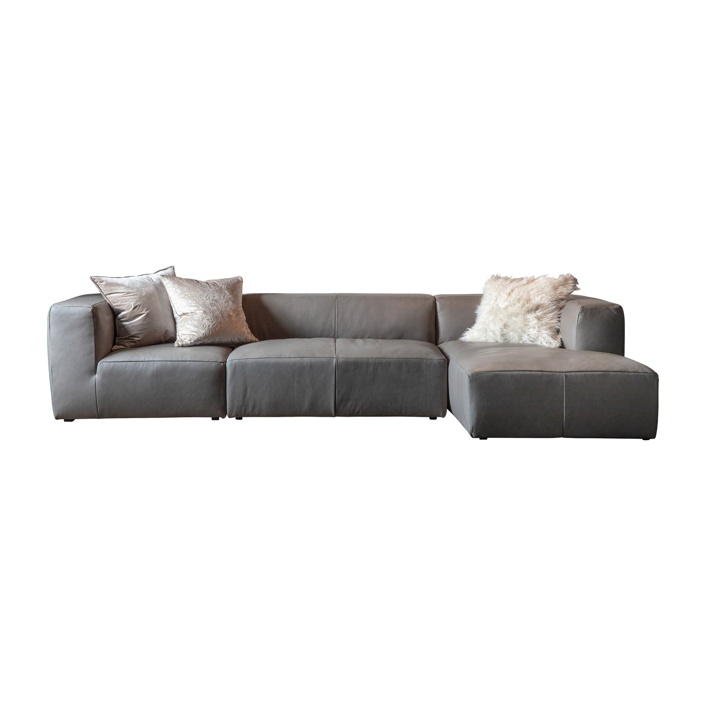 A Ravenna Corner Chaise Grey Leather sectional sofa with pillows for stylish home furniture.