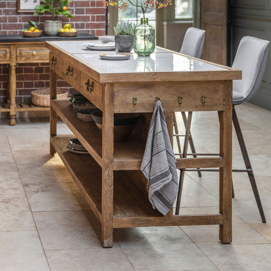 A Kikiathome.co.uk Halwell Kitchen Island 2140x770x940mm set with chairs and a table, perfect for home furniture and interior decor.