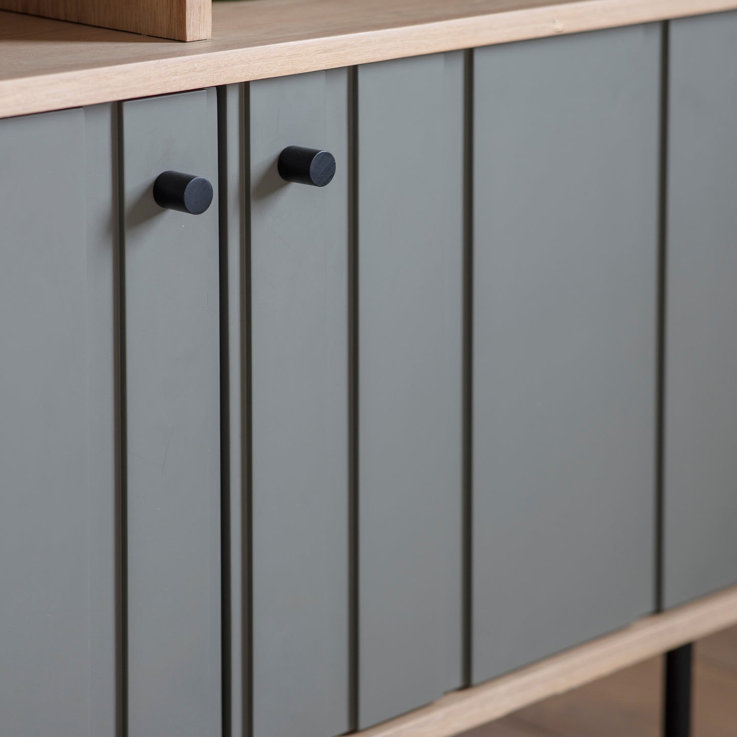 A Sparkwell Open Display sideboard with black handles and knobs for interior decor and home furniture.