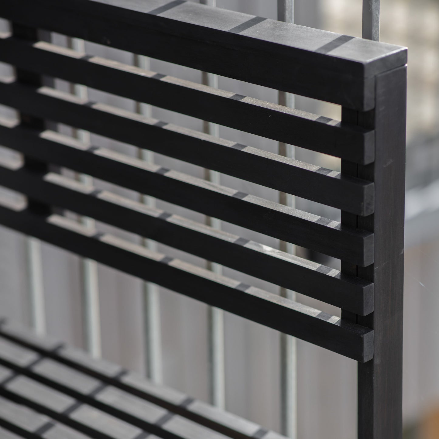 Interior decor, Home furniture: Close-up of an Alfrington Balcony Modular Bench Charcoal with slats available from Kikiathome.co.uk.