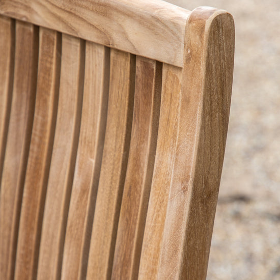 A close up of an Arlington Stackable Dining Chair (2pk) for home furniture.