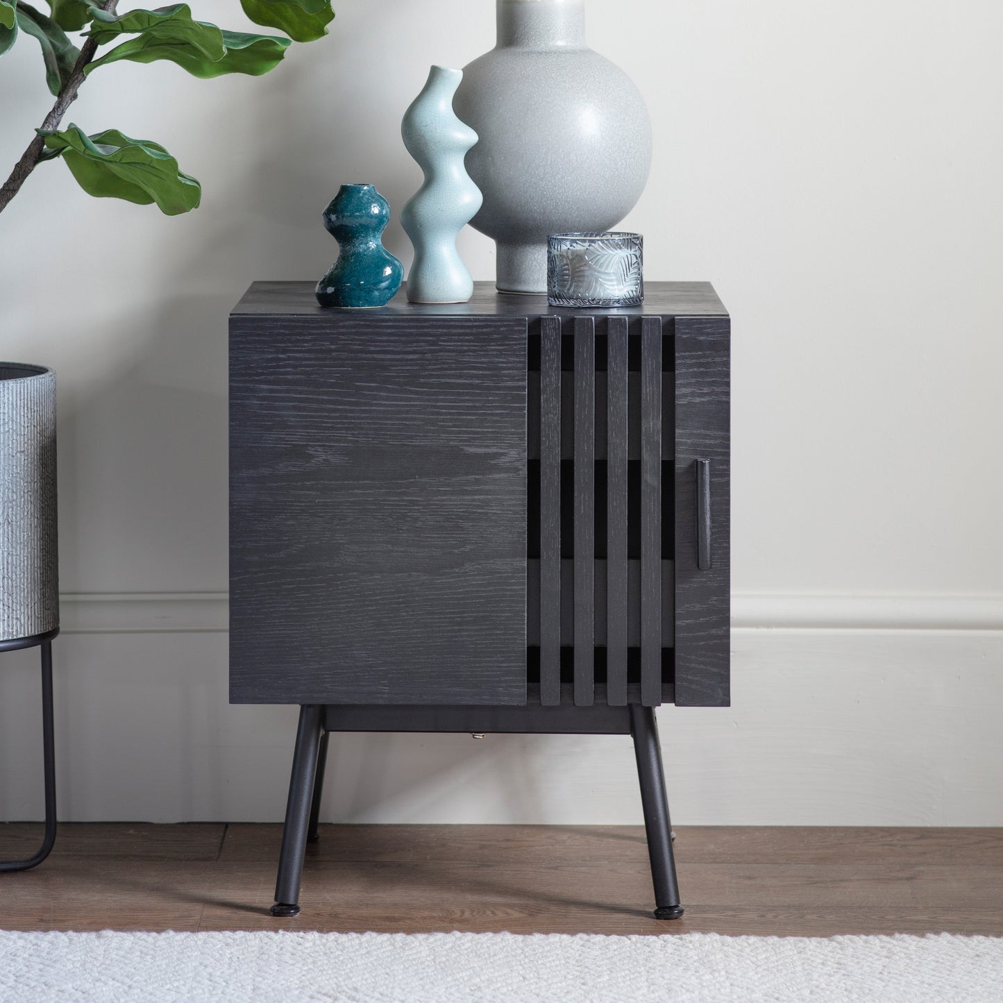 A Black Holston Side Table by Kikiathome.co.uk adding style to your home's interior decor.