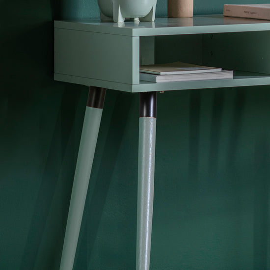 A Mint Thurlestone Console Table with a pig on it from Kikiathome.co.uk, perfect for interior decor.