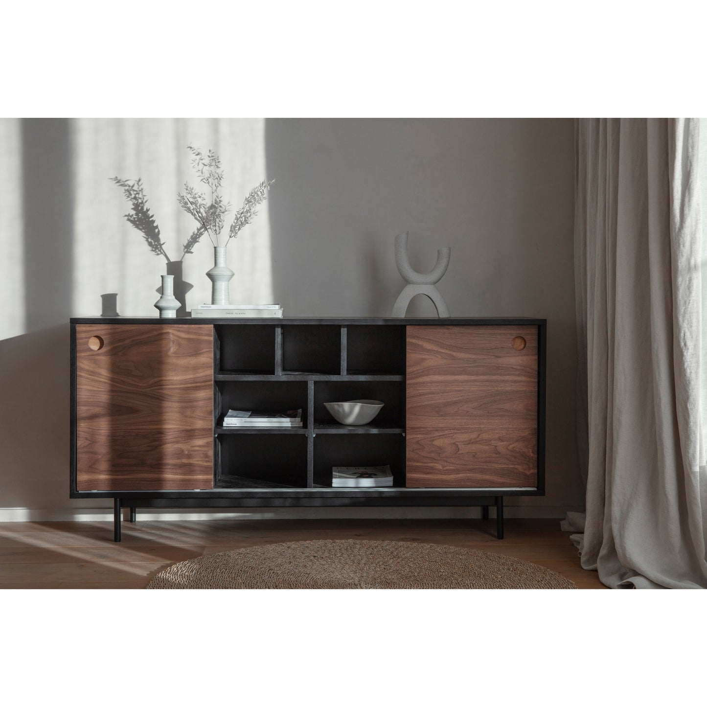 A Barbican Sideboard 1600x400x750mm by Kikiathome.co.uk adds elegance to any interior decor with its sleek design and spacious surface, perfect for showcasing vases or