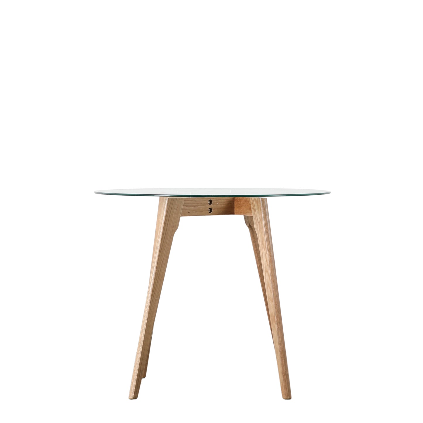 An Ashprington Round Dining Table Oak 900x900x750mm with wooden legs and a glass top, perfect for interior decor.