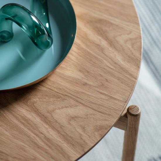 An Allington Coffee Table Oak 700x700x400mm from Kikiathome.co.uk enhances interior decor on a wooden table.