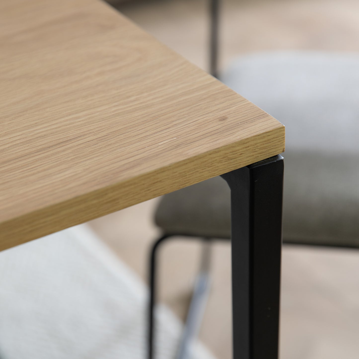 A close-up of the Staverton Dining Table by Kikiathome.co.uk showcasing its metal frame for interior decor.