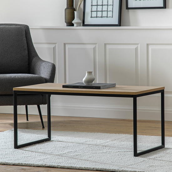 A Staverton Coffee Table 1000x500x450mm, an interior decor piece, in a living room with home furniture.