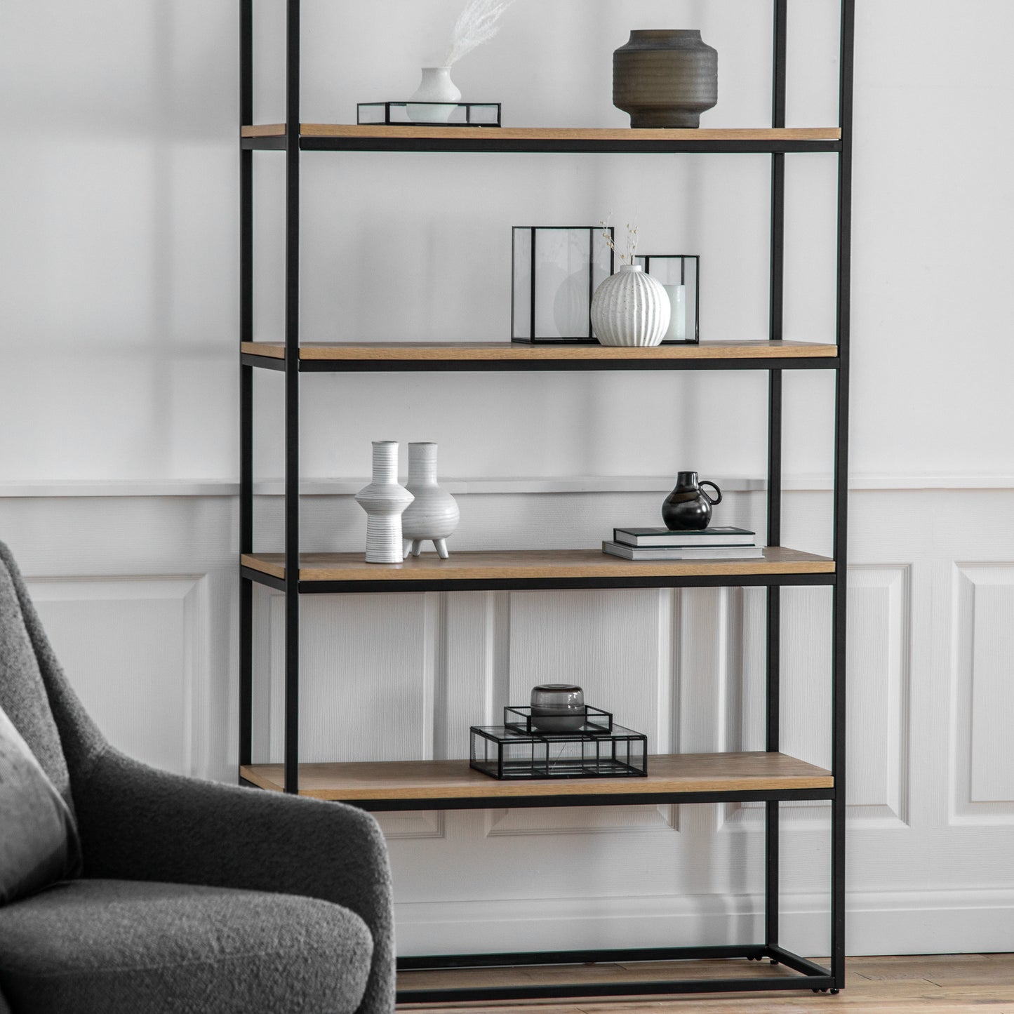 A Staverton Display Unit 1000x380x1800mm from Kikiathome.co.uk enhances the interior decor in a living room.