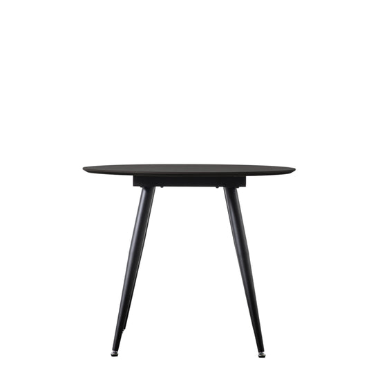 An Ashford Round Dining Table Black with black legs and a black top for home furniture and interior decor from Kikiathome.co.uk.
