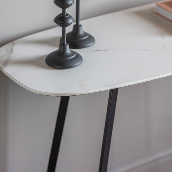 A white marble console table with two lamps, perfect for home furniture and interior decor.