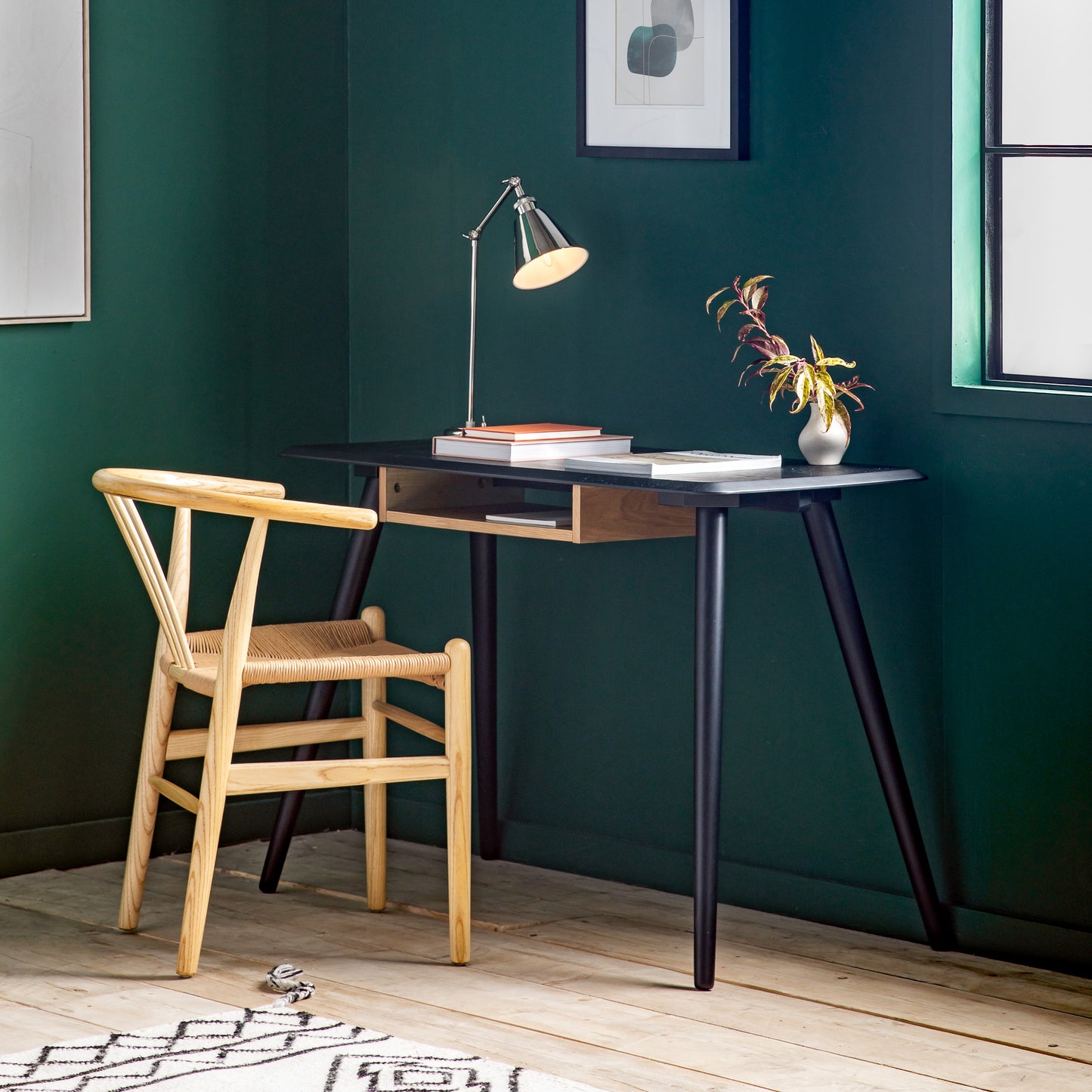Interior decor, Home furniture: A Maddox Desk with Shelf 110x50x750mm and chair in a room with green walls seamlessly complement the interior decor with their stylish design.