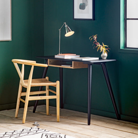 Interior decor, Home furniture: A Maddox Desk with Shelf 110x50x750mm and chair in a room with green walls seamlessly complement the interior decor with their stylish design.