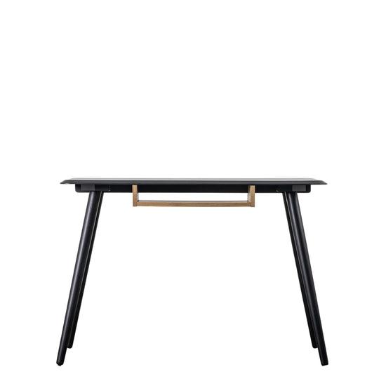 Kiki at Home.co.uk offers an interior décor piece, the Maddox Desk with Shelf, featuring gold legs and a black glass top.