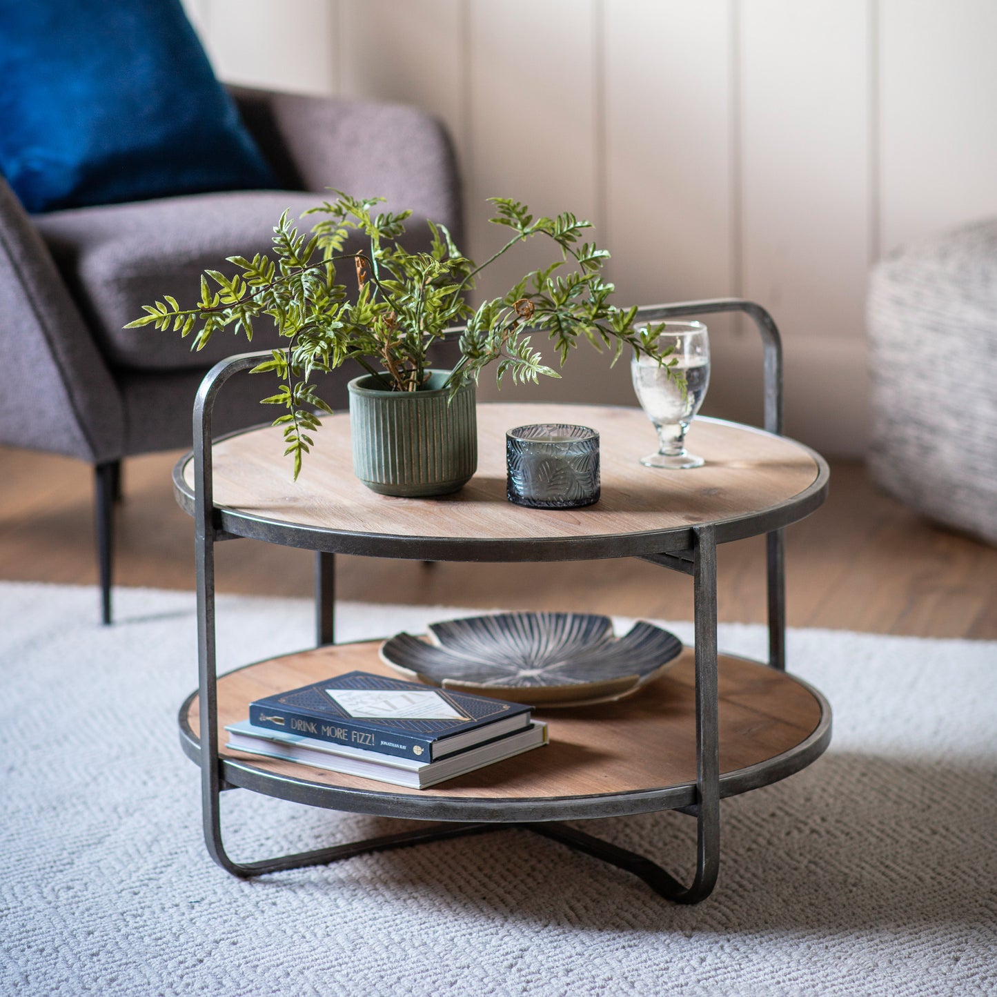 A Lutton Coffee Table Oak 650x650x500mm by Kikiathome.co.uk, blending home furniture with a plant on top for interior decor.