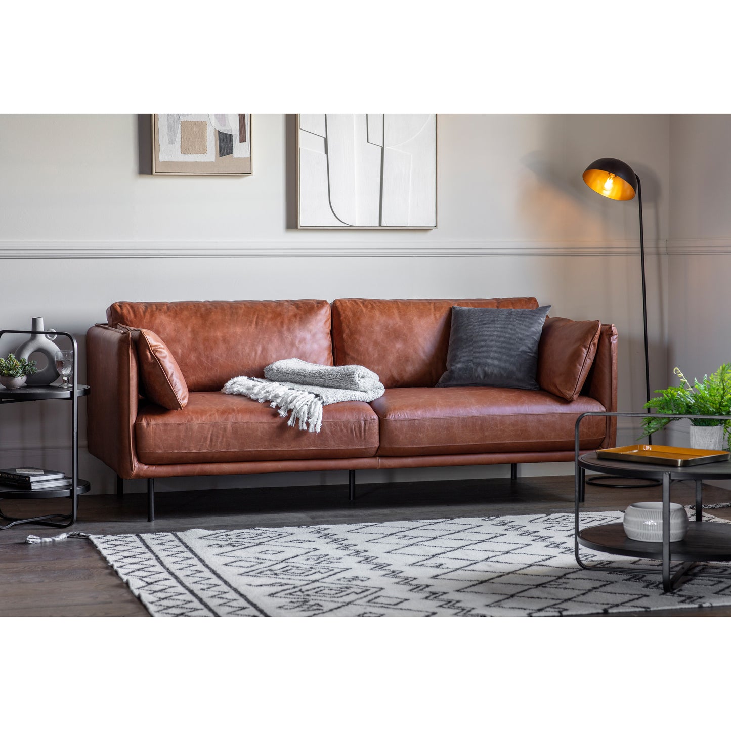 A Wigmore Sofa Brown Leather in a living room, part of the home furniture collection from Kikiathome.co.uk.