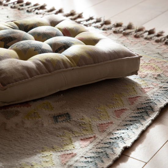 Load image into Gallery viewer, A home interior decor rug with cushion from Kikiathome.co.uk.
