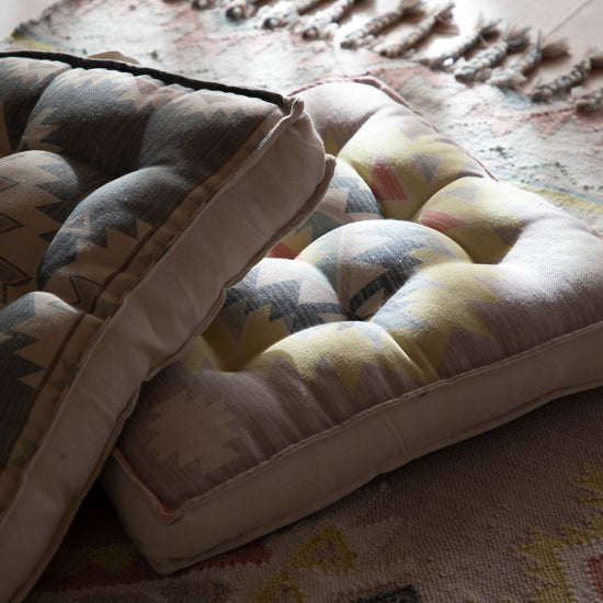 Load image into Gallery viewer, Home furniture and interior decor: Two SG Aztec Printed Floor Cushion Grey 580x580mm by Kikiathome.co.uk laying on top of a rug.
