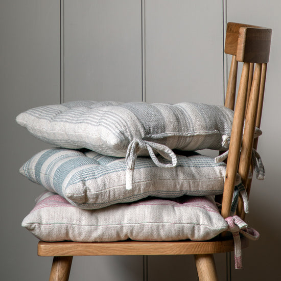 Load image into Gallery viewer, Four Simply Organic Str Seatpad Grey 430x430mm (2pk) stacked on a wooden chair, perfect for home furniture and interior decor from Kikiathome.co.uk.
