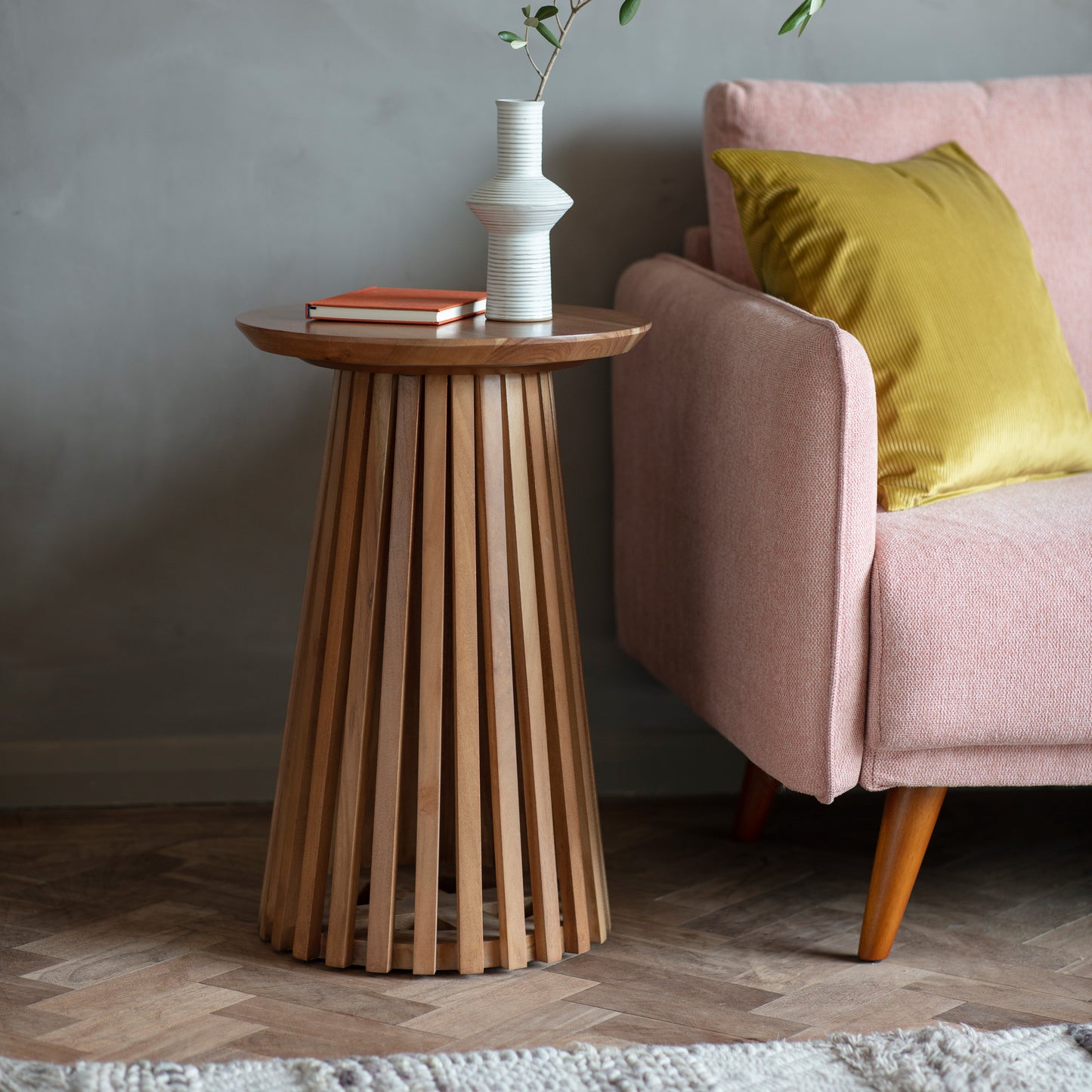 A Ditsum slatted side table 400x400x600mm by Kikiathome.co.uk as home furniture in a living room with a pink couch.