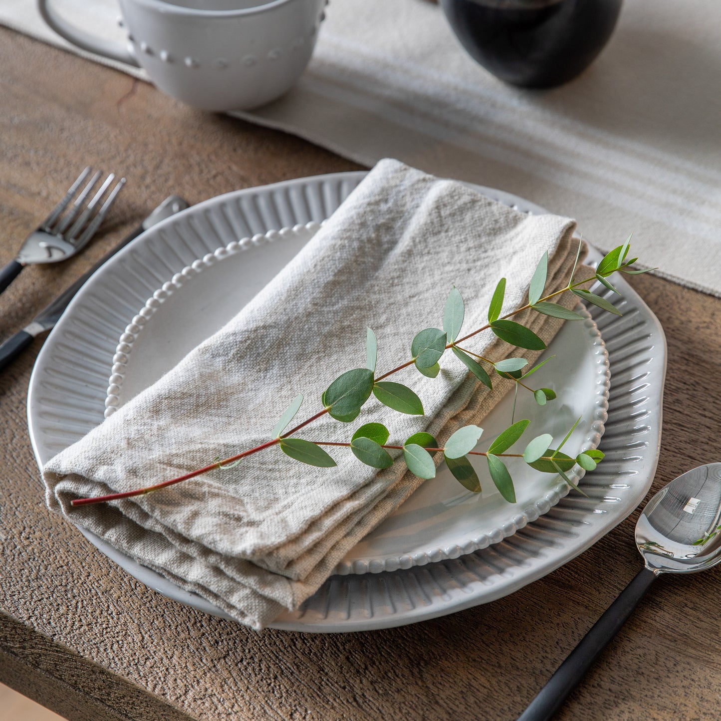 A Stripe Napkin Natural with eucalyptus from Kikiathome.co.uk adds a touch of interior decor to your home.
