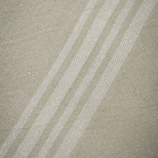 A natural 450x450mm napkin with white stripes for interior decor.