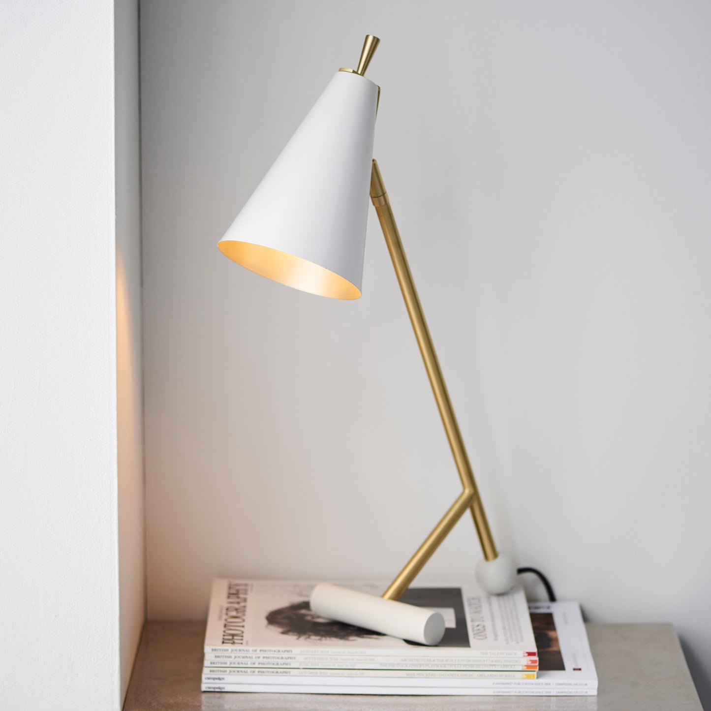 A Lyndhurst Table Lamp Satin Brass/White by Kikiathome.co.uk adding sophistication to your interior decor.