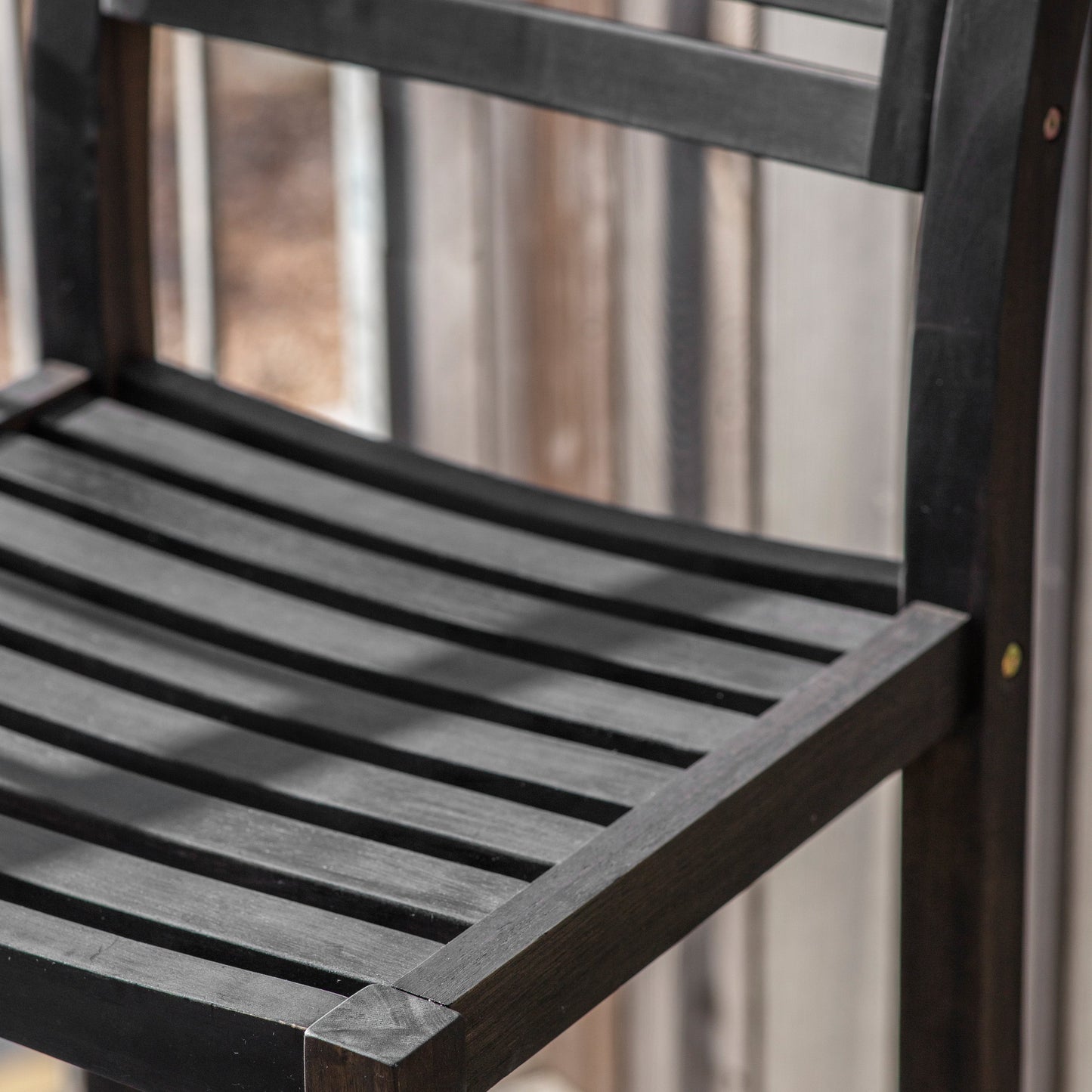A close up of a Kikiathome.co.uk Alfrington Bar Stools Black (2pk) patio chair for interior decor.