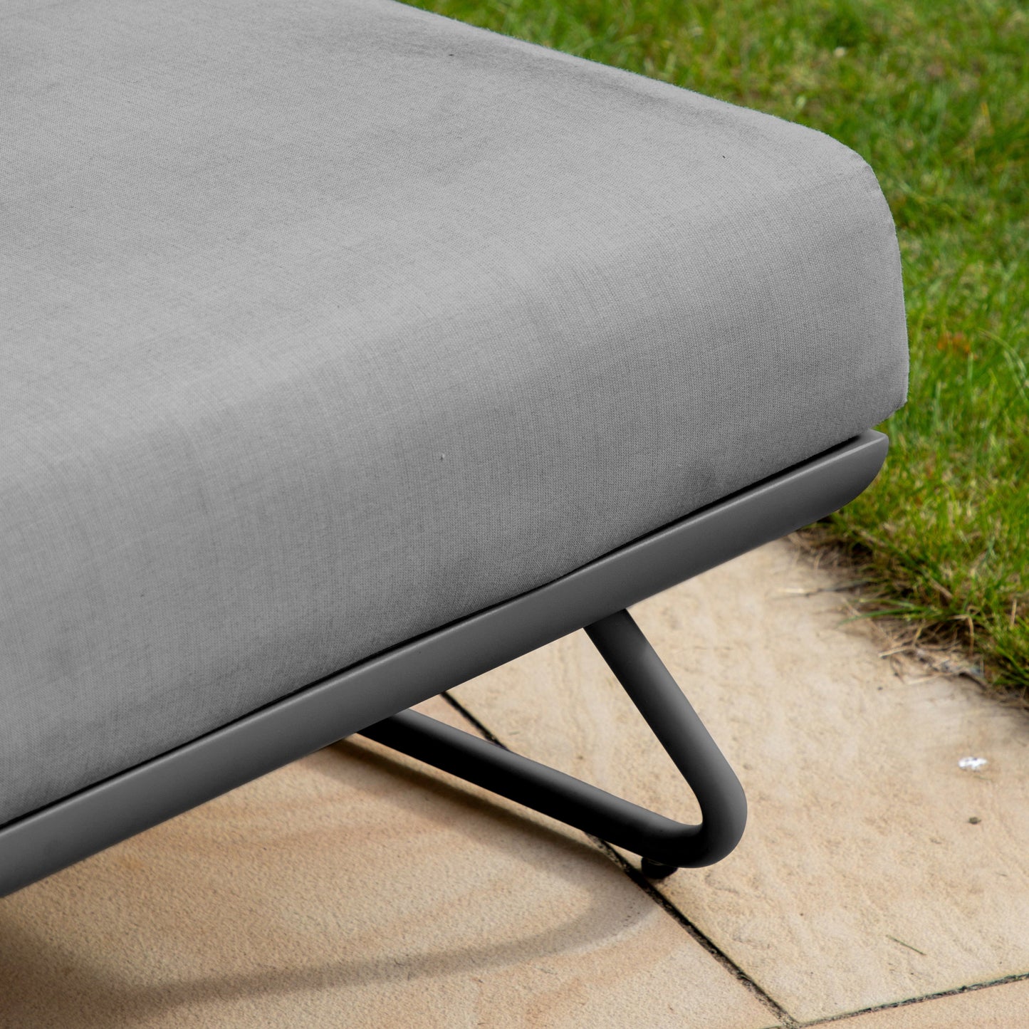 A Home furniture Sun Lounger Slate from Kikiathome.co.uk on top of a metal frame.