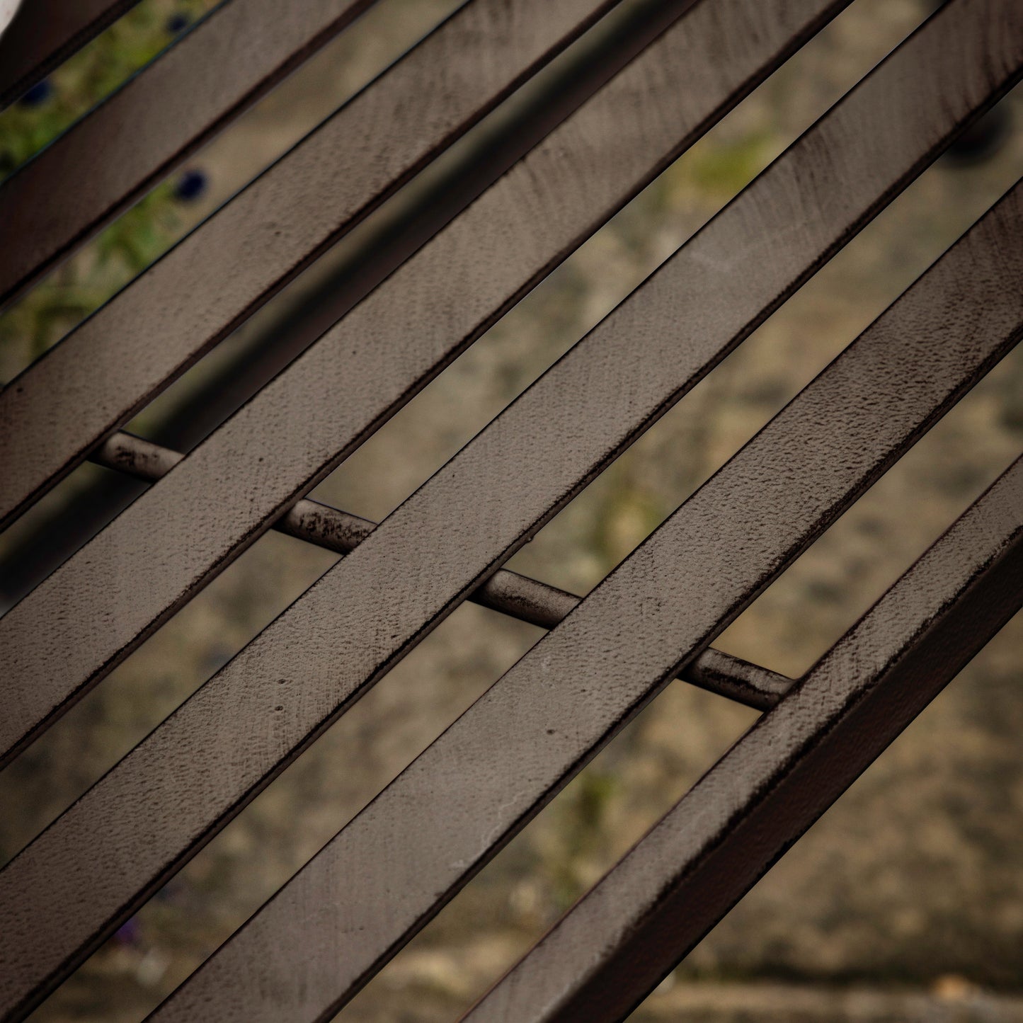 Farringdon Outdoor Bench Noir with metal railing for interior decor.